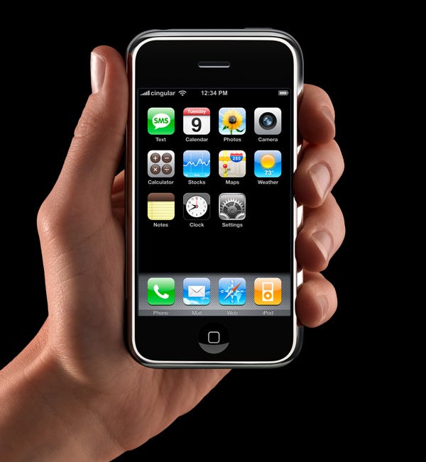 An iconic image of the first iPhone being held by hand was featured in the original introduction to the iPhone page on apple.com