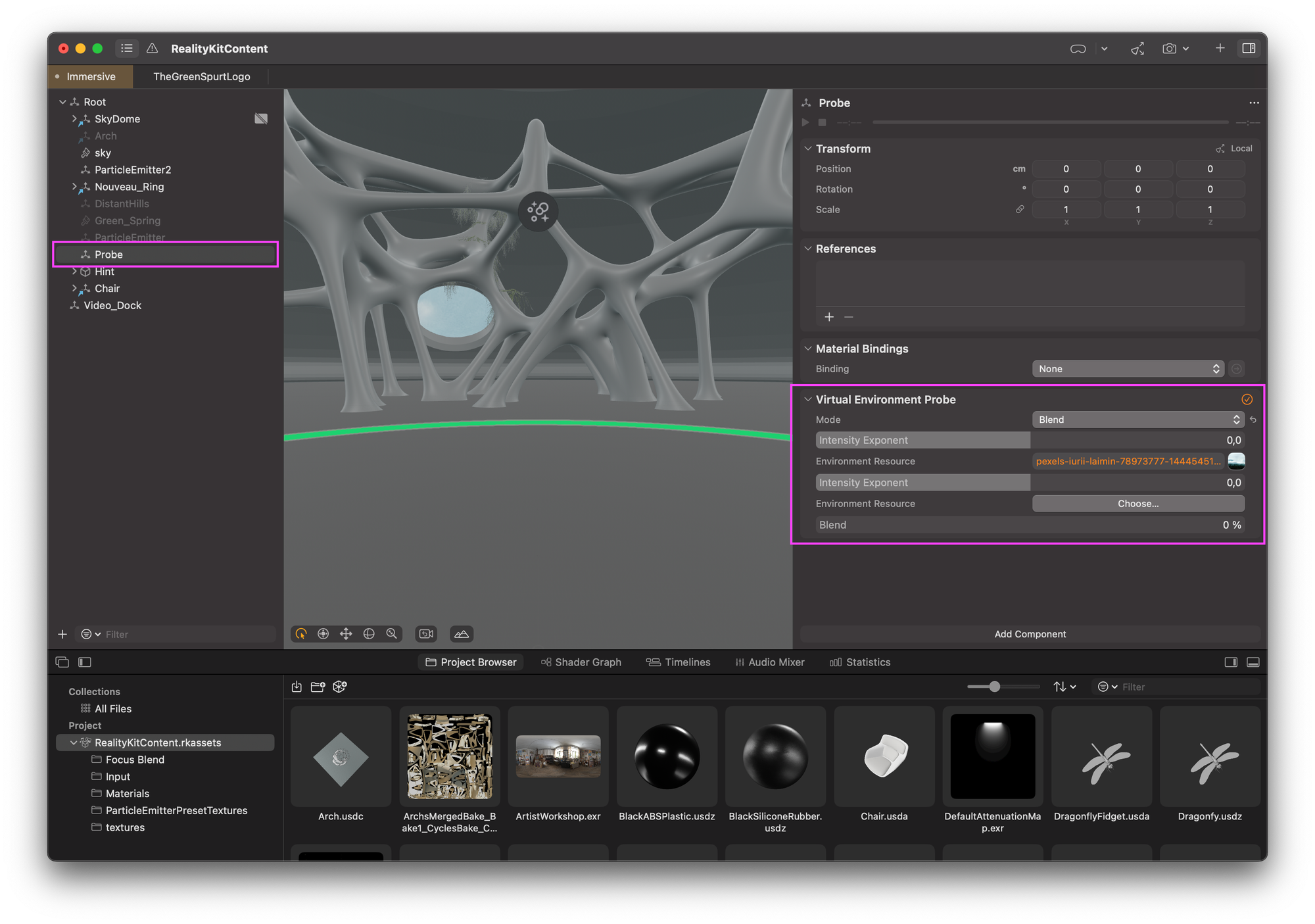 The screenshot of Reality Composer Pro  In the center, there's a 3D viewport displaying a gray, voronoi-looking architecture structure with intricate branching  The left outline side contains a hierarchical project browser showing various elements including: - SkyDome - ParticleEmitter - Mesh - Probe (currently selected) - Other assets  The right inspectr displays properties and settings for the selected "Probe" object, including a "Virtual Environment Probe" section with settings for Mode (set to "Blend"), Intensity Exponent, and Environment Resource  At the bottom of the interface is a project browser showing thumbnails of various assets including materials, textures, and 3D models with file extensions like .usd and .exr.