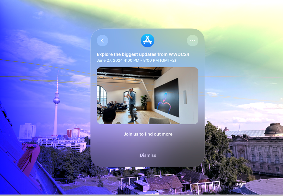 Berlin’s TV tower seen from Apple’s office, with a highly filtered photo featuring a visionOS alert mockup in the center